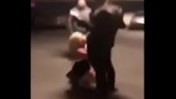 Blonde cougar deepthroats black dick in an elevator